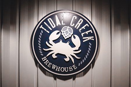 tidal creek brewhouse sign on a wall